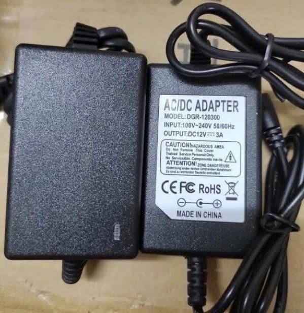 Nguồn Adapter máy tính DGR-120300,  12V3A